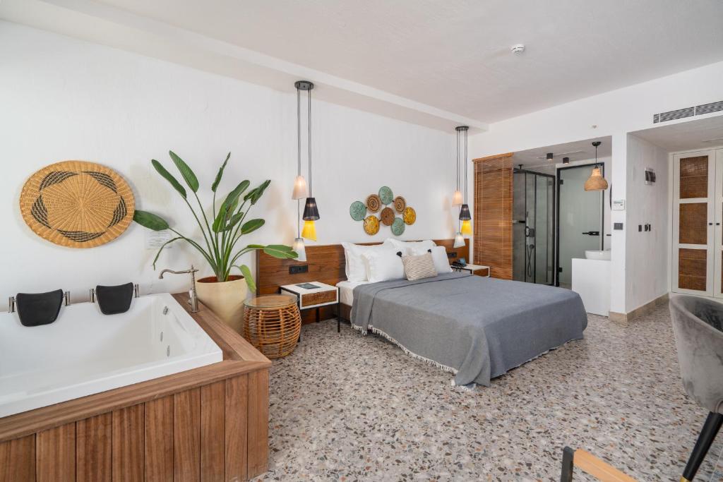 Ölüdeniz Blu Luxury Unique Hotel - Adults-Only客房内的一张或多张床位