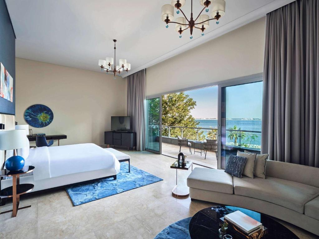 Rixos The Palm Hotel &amp; Suites - Ultra All Inclusive客房内的一张或多张床位