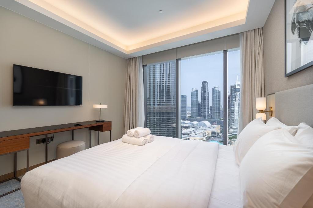Address Residences Dubai Opera - Burj Khalifa City Views 1, 2, &amp; 3-Bedroom Apartment 1 minute walk to Burj Khalifa, Dubai Mall, Dubai Fountain by Heaven Crest客房内的一张或多张床位