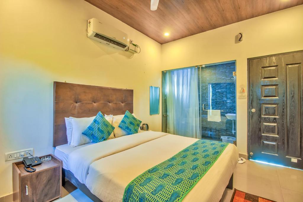 The Balaji inn Baga客房内的一张或多张床位