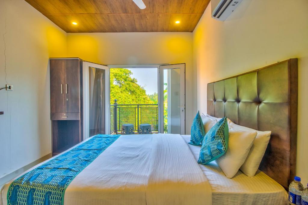 The Balaji inn Baga客房内的一张或多张床位