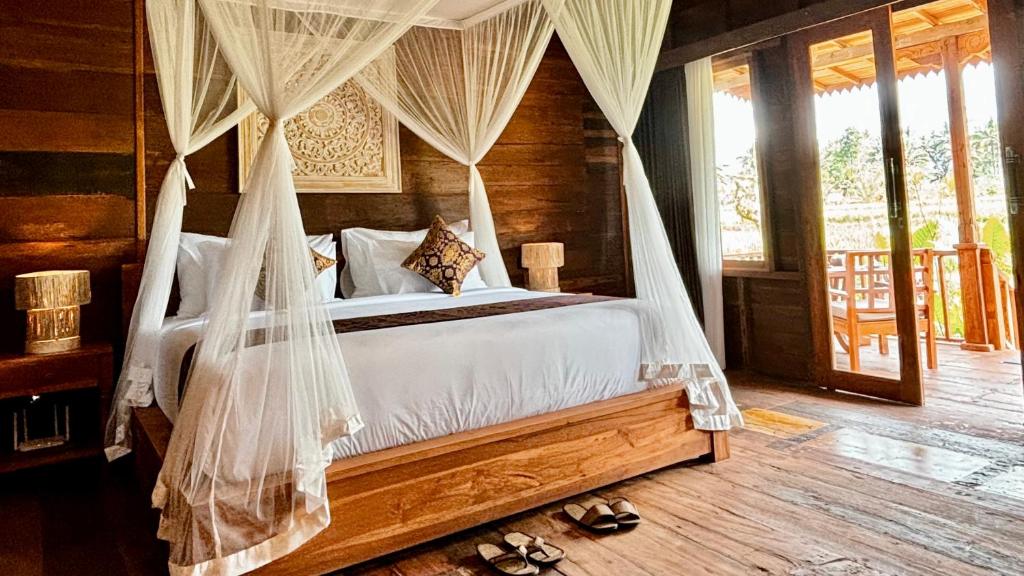 Jagadhita Villas Ubud Bali客房内的一张或多张床位