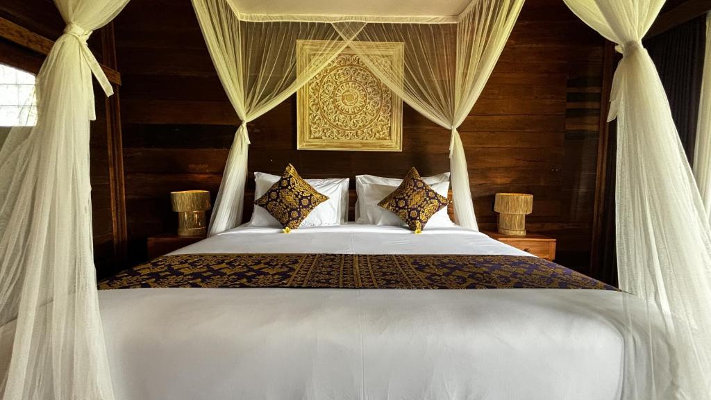Jagadhita Villas Ubud Bali客房内的一张或多张床位