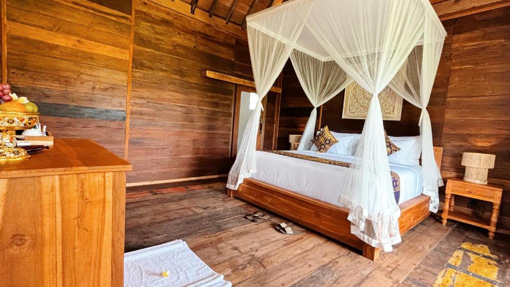 Jagadhita Villas Ubud Bali客房内的一张或多张床位