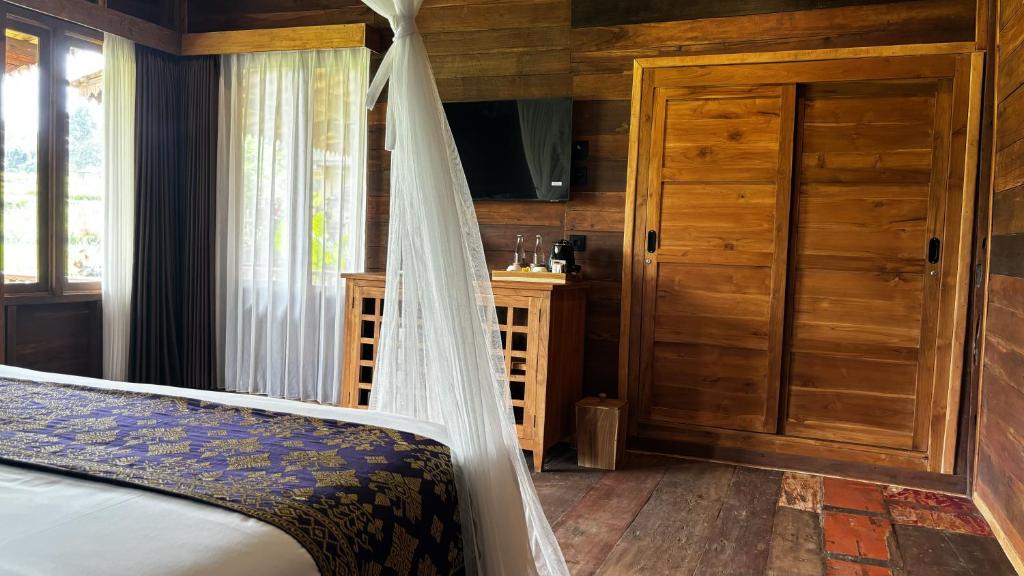 Jagadhita Villas Ubud Bali客房内的一张或多张床位