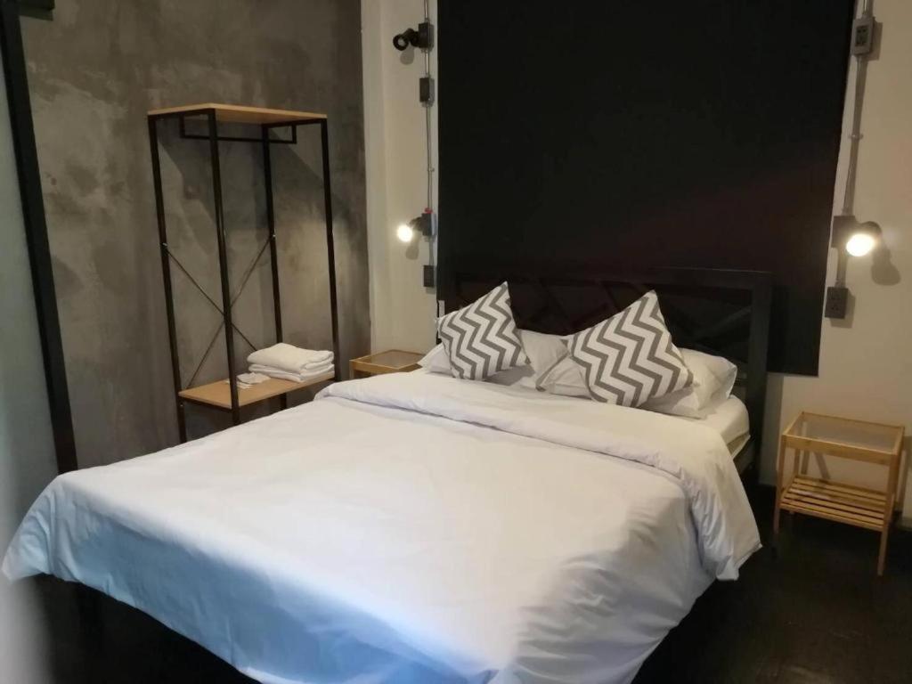 Dreamcatcher Bangkok客房内的一张或多张床位