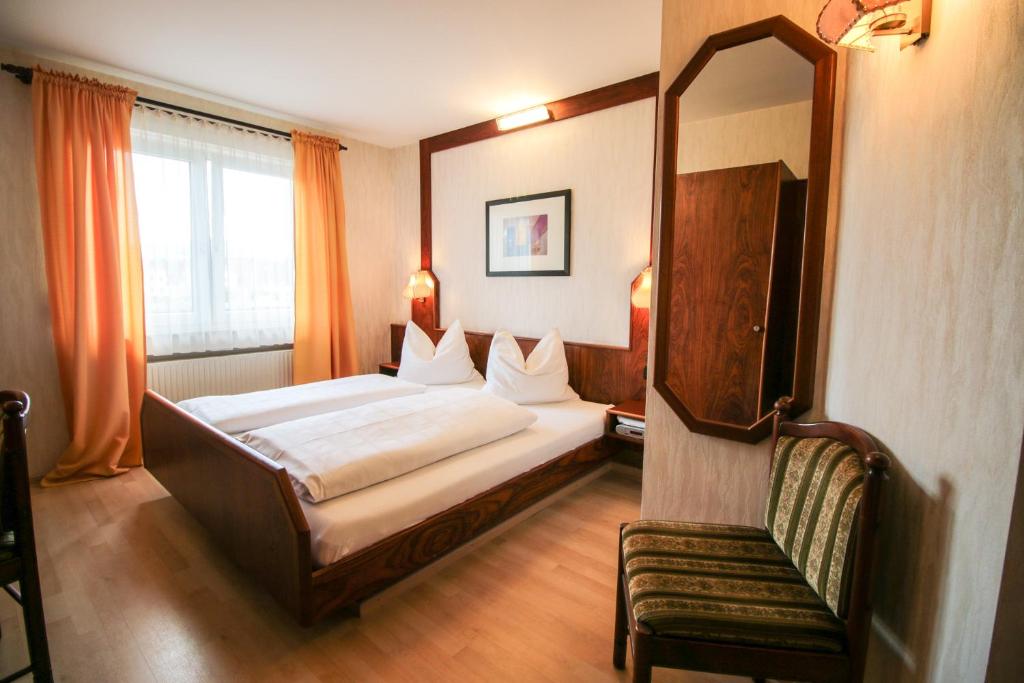 Hotel-Restaurant und Gästehaus Löwen客房内的一张或多张床位
