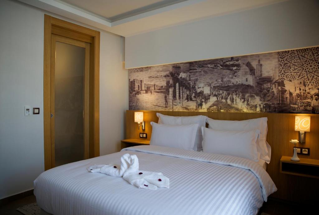 拉巴特总站奥诺莫酒店客房内的一张或多张床位