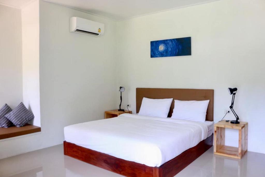 The Lodge at Koh Kood客房内的一张或多张床位