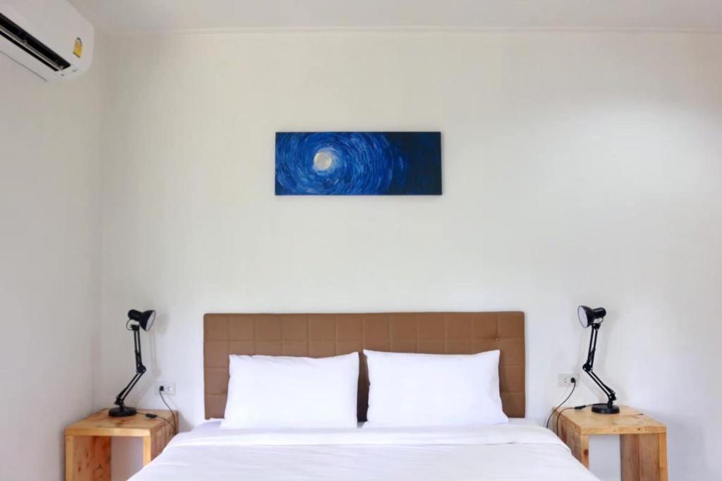 The Lodge at Koh Kood客房内的一张或多张床位