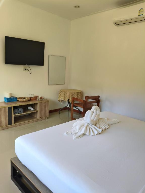 The Lodge at Koh Kood客房内的一张或多张床位