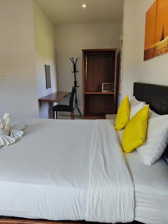 The Lodge at Koh Kood客房内的一张或多张床位