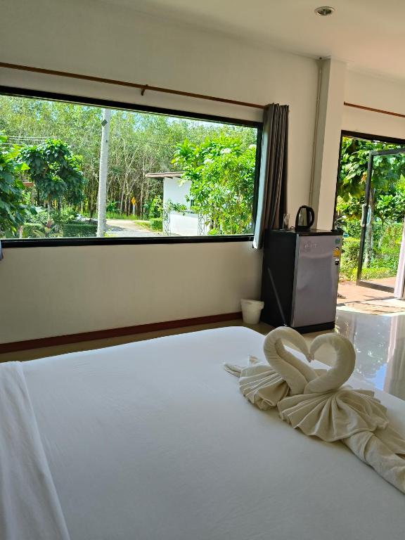 The Lodge at Koh Kood客房内的一张或多张床位