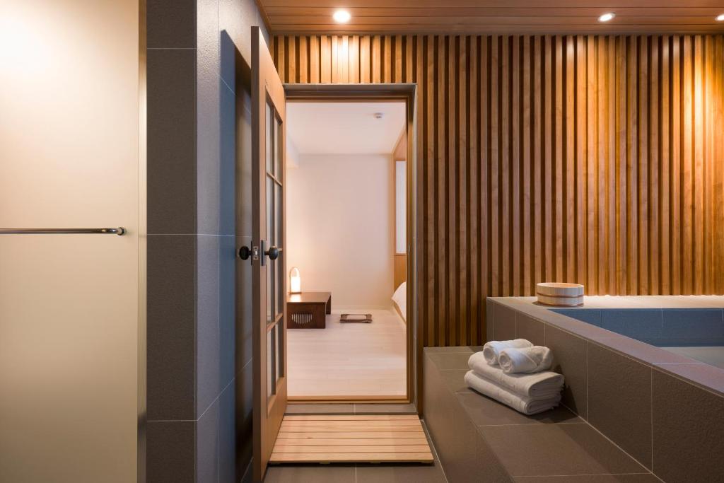 Hotel Yusurim客房内的一张或多张床位