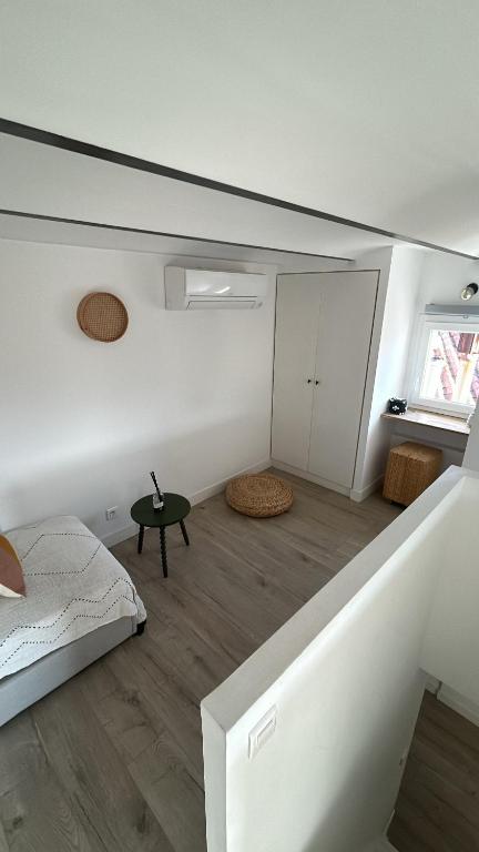 Place aux huiles客房内的一张或多张床位