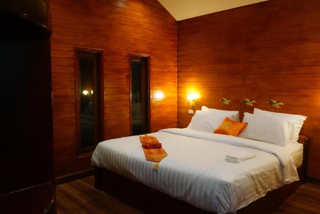阮三泰精品度假屋客房内的一张或多张床位