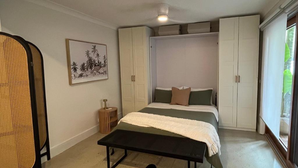 Avalon Beach Guesthouse客房内的一张或多张床位