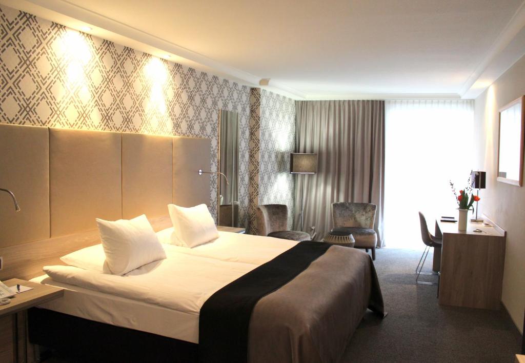 欧洲厄兹基瑟瑞酒店客房内的一张或多张床位