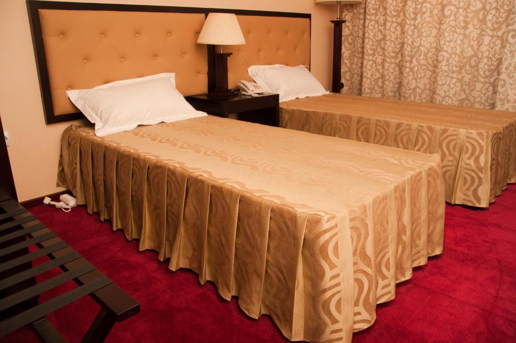 Hotel Baden客房内的一张或多张床位