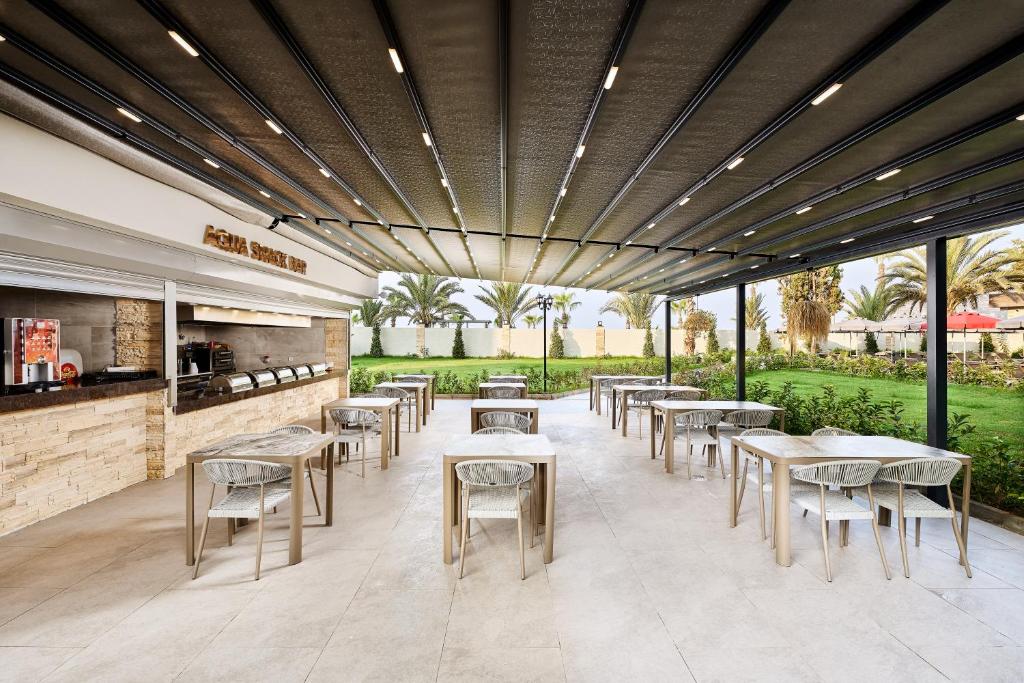 Elysee Rive Hotel餐厅或其他用餐的地方