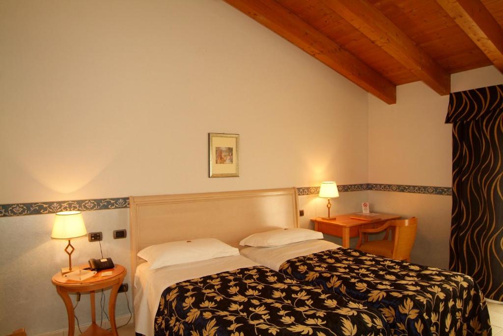 Hotel Ristorante Novecento客房内的一张或多张床位