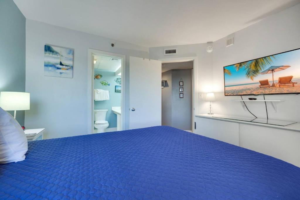 The 7th Heaven in Myrtle Beach客房内的一张或多张床位