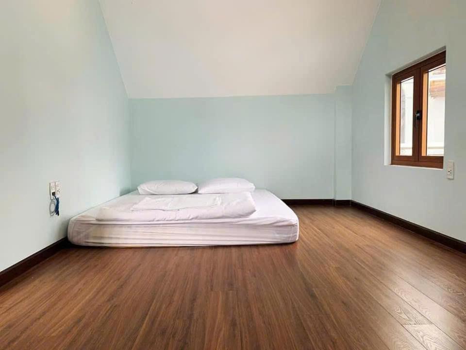 NHỚ House IV客房内的一张或多张床位