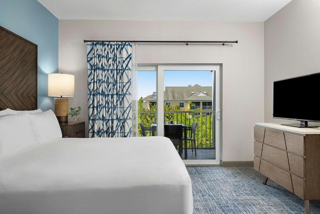 Sheraton Broadway Resort Villas客房内的一张或多张床位