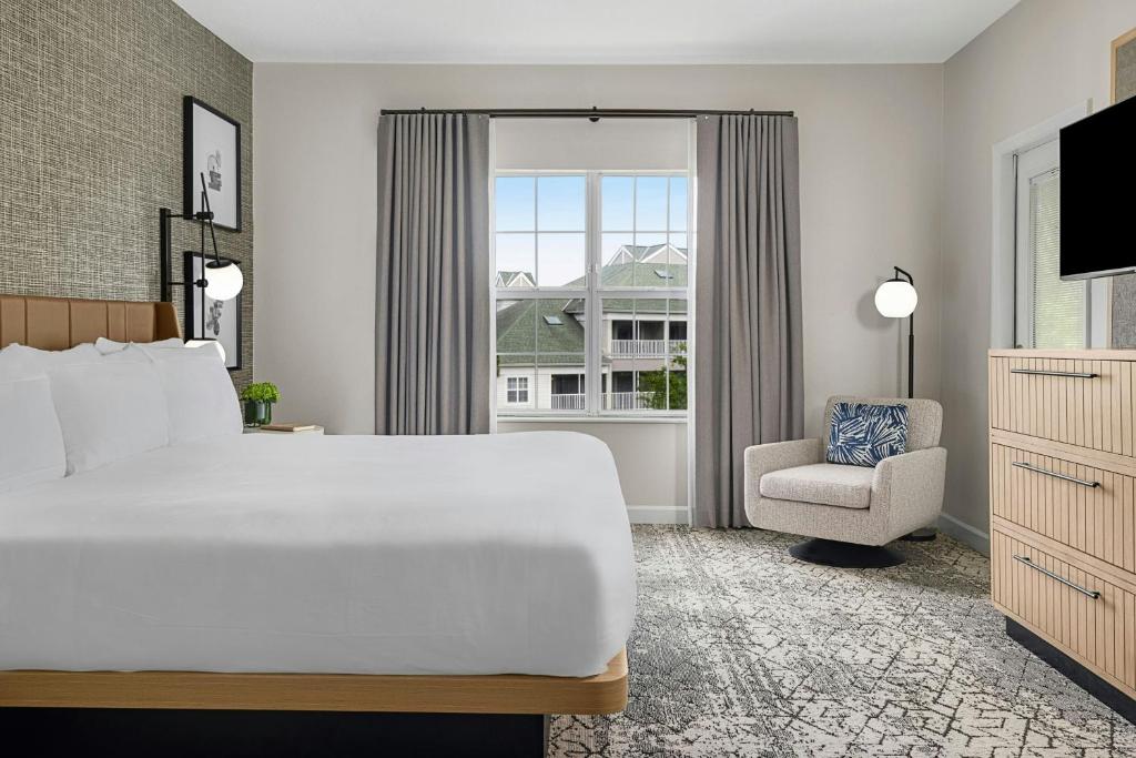Sheraton Broadway Resort Villas客房内的一张或多张床位