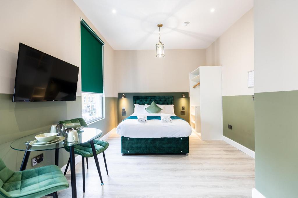 The Chapter Hotels - Finsbury Park客房内的一张或多张床位