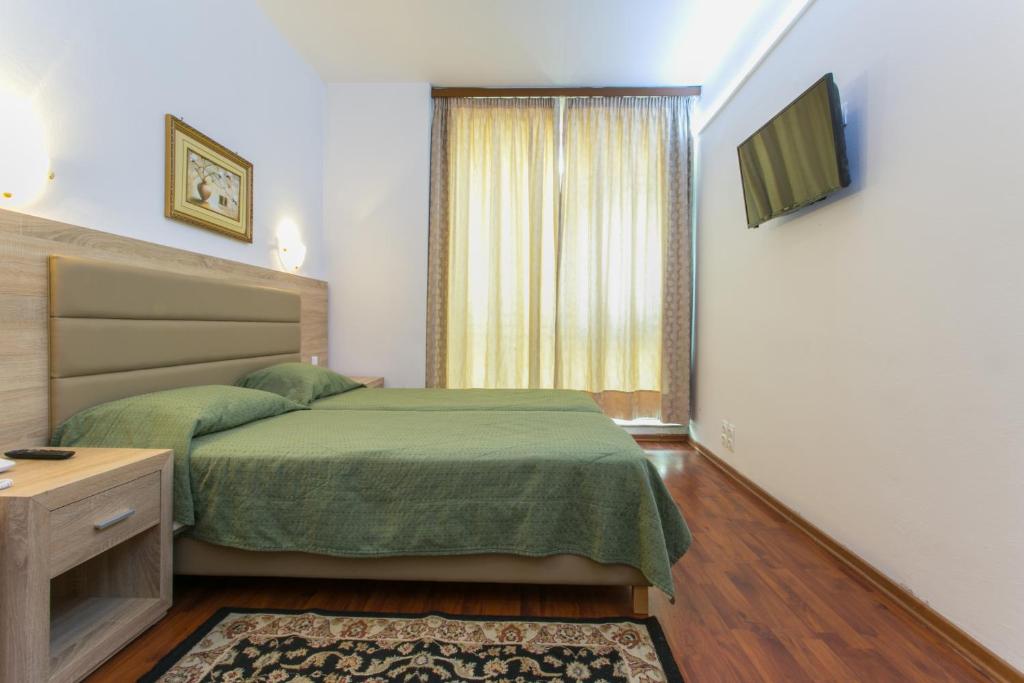 阿瑞图萨酒店客房内的一张或多张床位