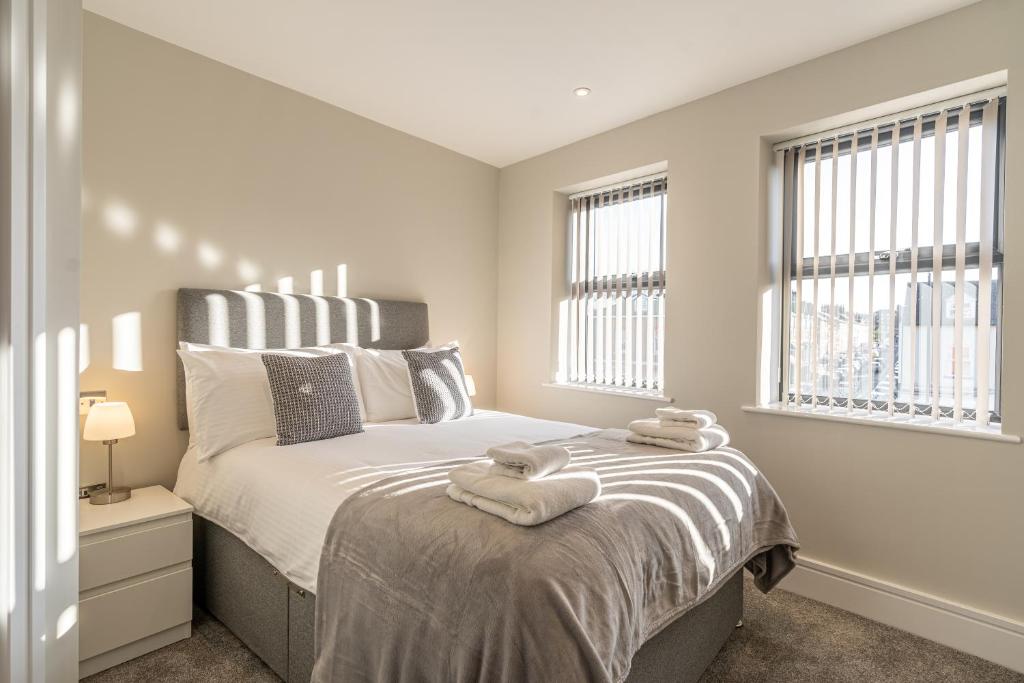 Bond House by Celador Apartments客房内的一张或多张床位