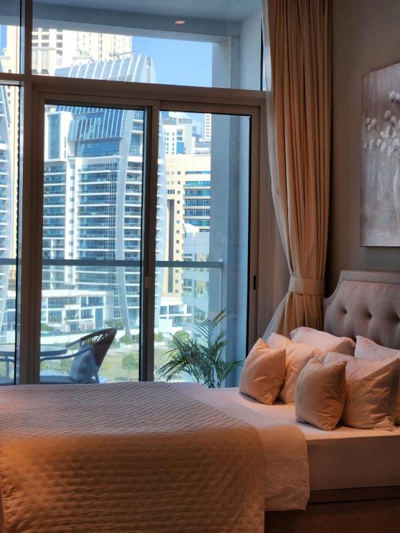 Studio One Dubai Marina - TIE Vacation Homes客房内的一张或多张床位