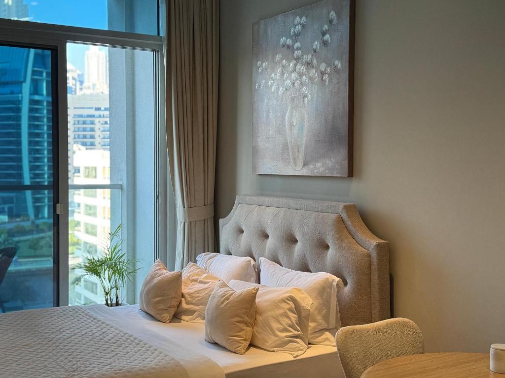 Studio One Dubai Marina - TIE Vacation Homes客房内的一张或多张床位