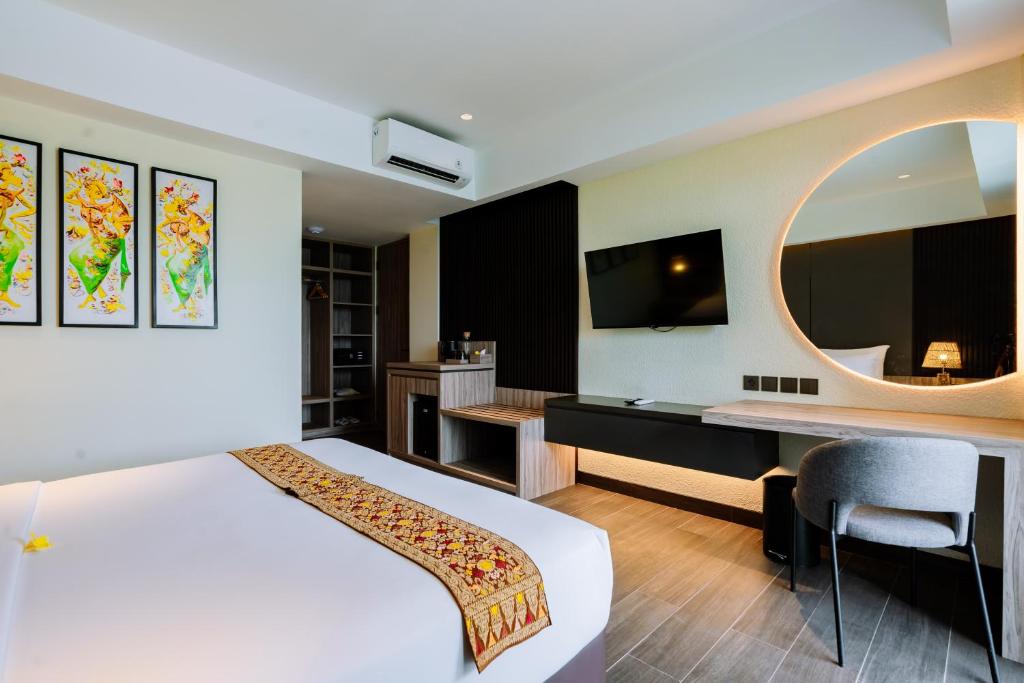 Big Dragon Villas Ubud客房内的一张或多张床位