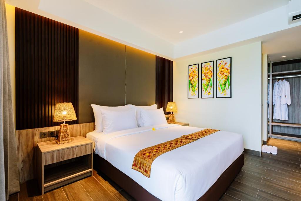 Big Dragon Villas Ubud客房内的一张或多张床位