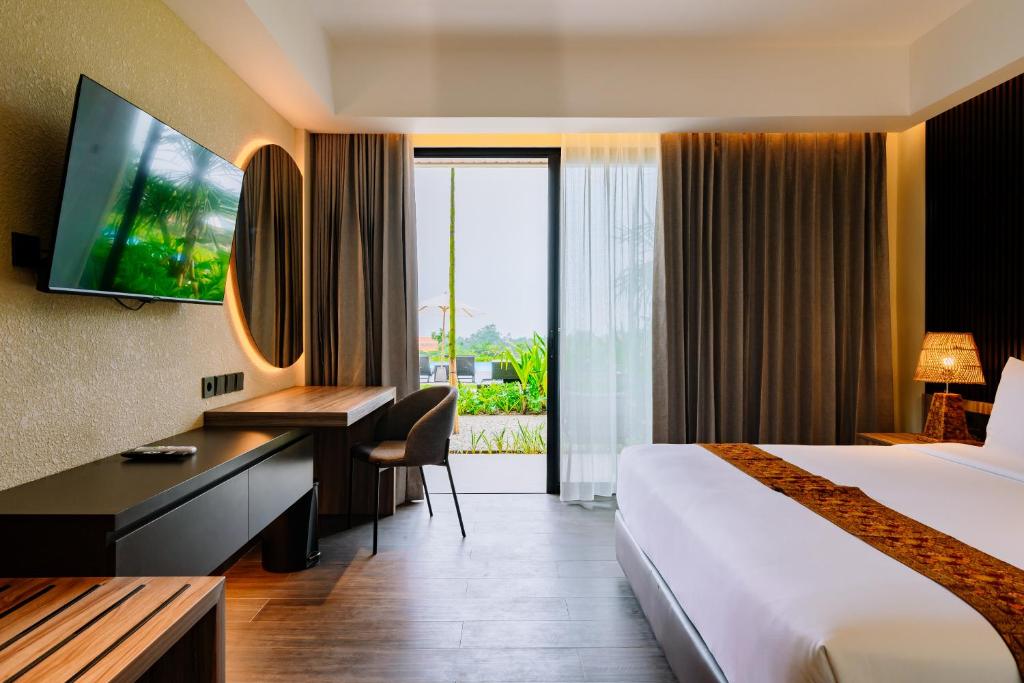 Big Dragon Villas Ubud客房内的一张或多张床位
