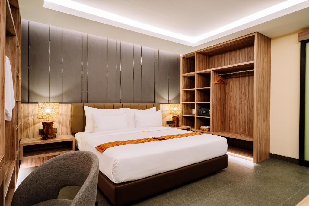 Big Dragon Villas Ubud客房内的一张或多张床位