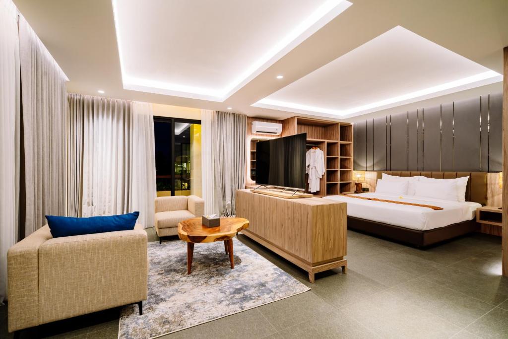 Big Dragon Villas Ubud客房内的一张或多张床位
