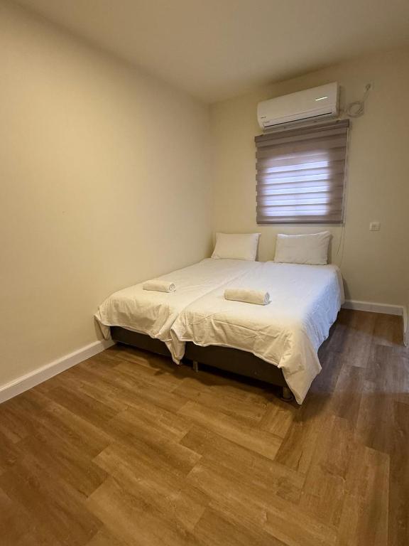 Bella Vista House - בלה ויסטה האוס客房内的一张或多张床位