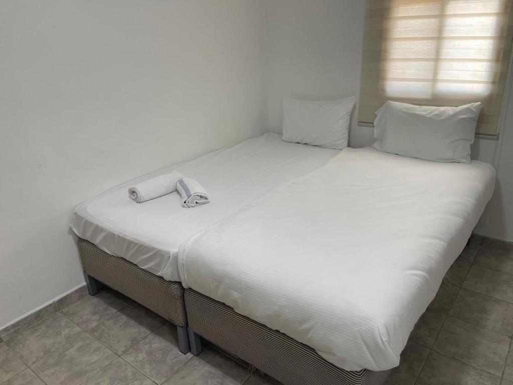 Bella Vista House - בלה ויסטה האוס客房内的一张或多张床位