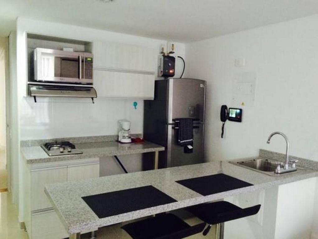 Rent Apartments Manizales的厨房或小厨房