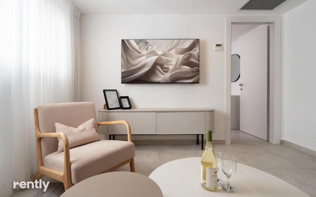 Luxury Apartments And Studios At Sea Side By Rently的电视和&#47;或娱乐中心
