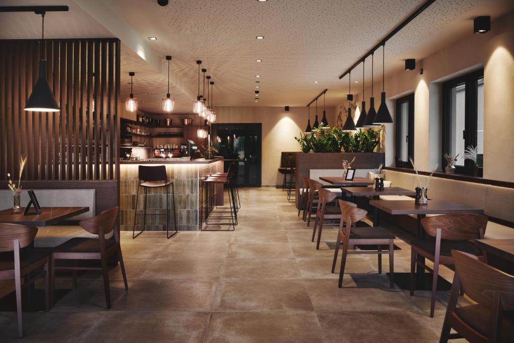 Boutiquehotel DAS ZEITWERT餐厅或其他用餐的地方