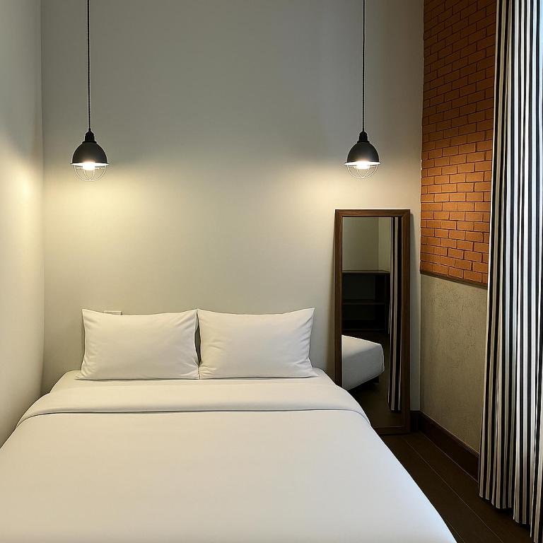 Khunluang Hostel客房内的一张或多张床位