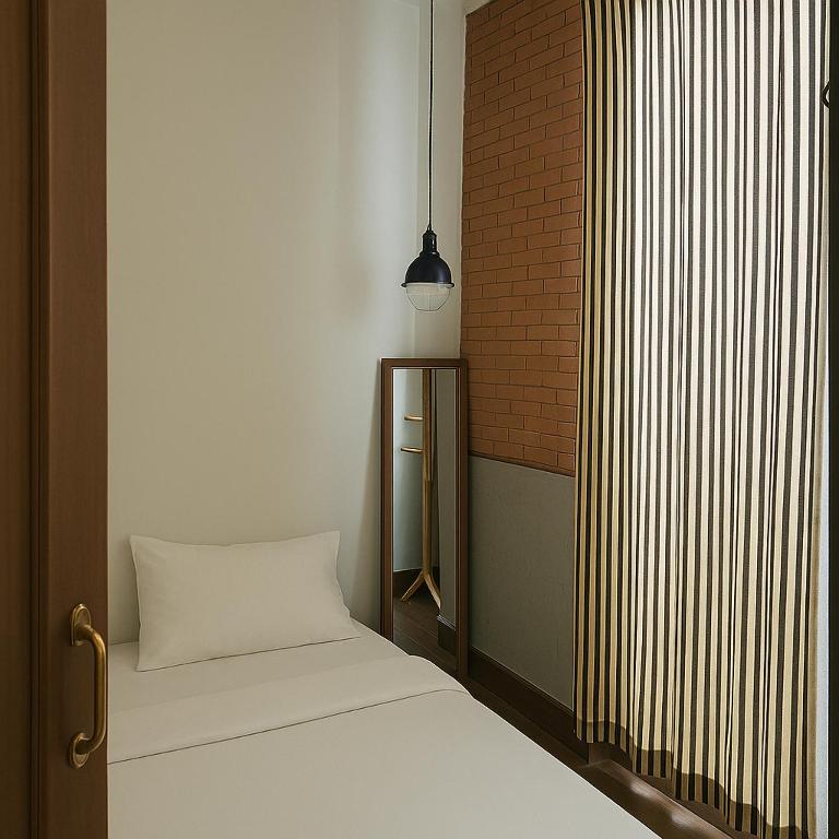 Khunluang Hostel客房内的一张或多张床位