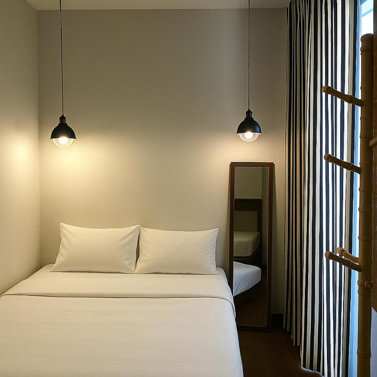 Khunluang Hostel客房内的一张或多张床位