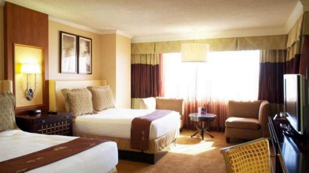 Harrahs Hotel Reno客房内的一张或多张床位