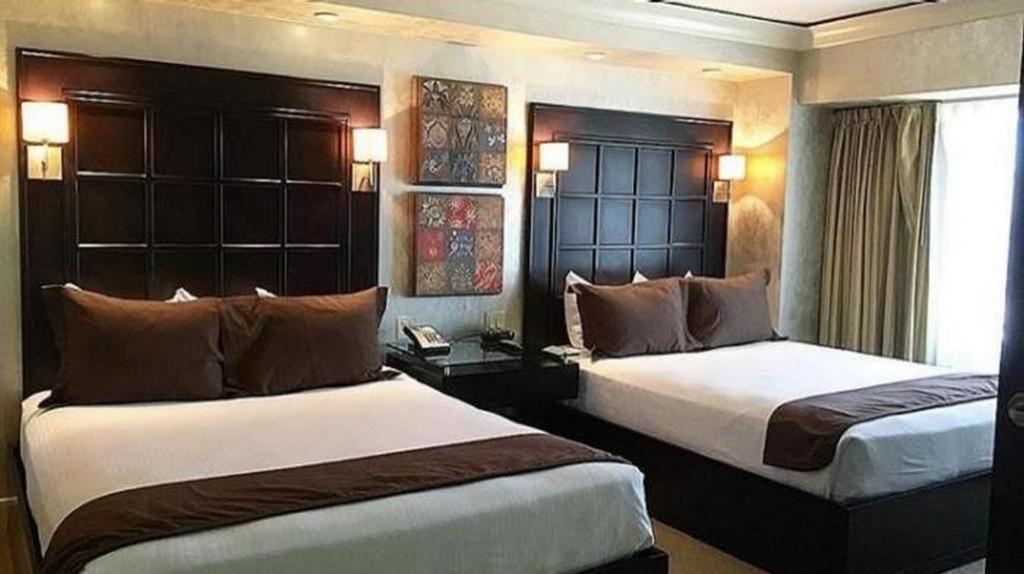 Harrahs Hotel Reno客房内的一张或多张床位