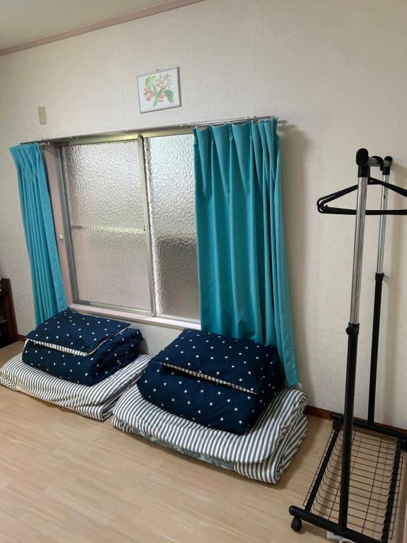 ハイツドリーム梦想小屋客房内的一张或多张床位